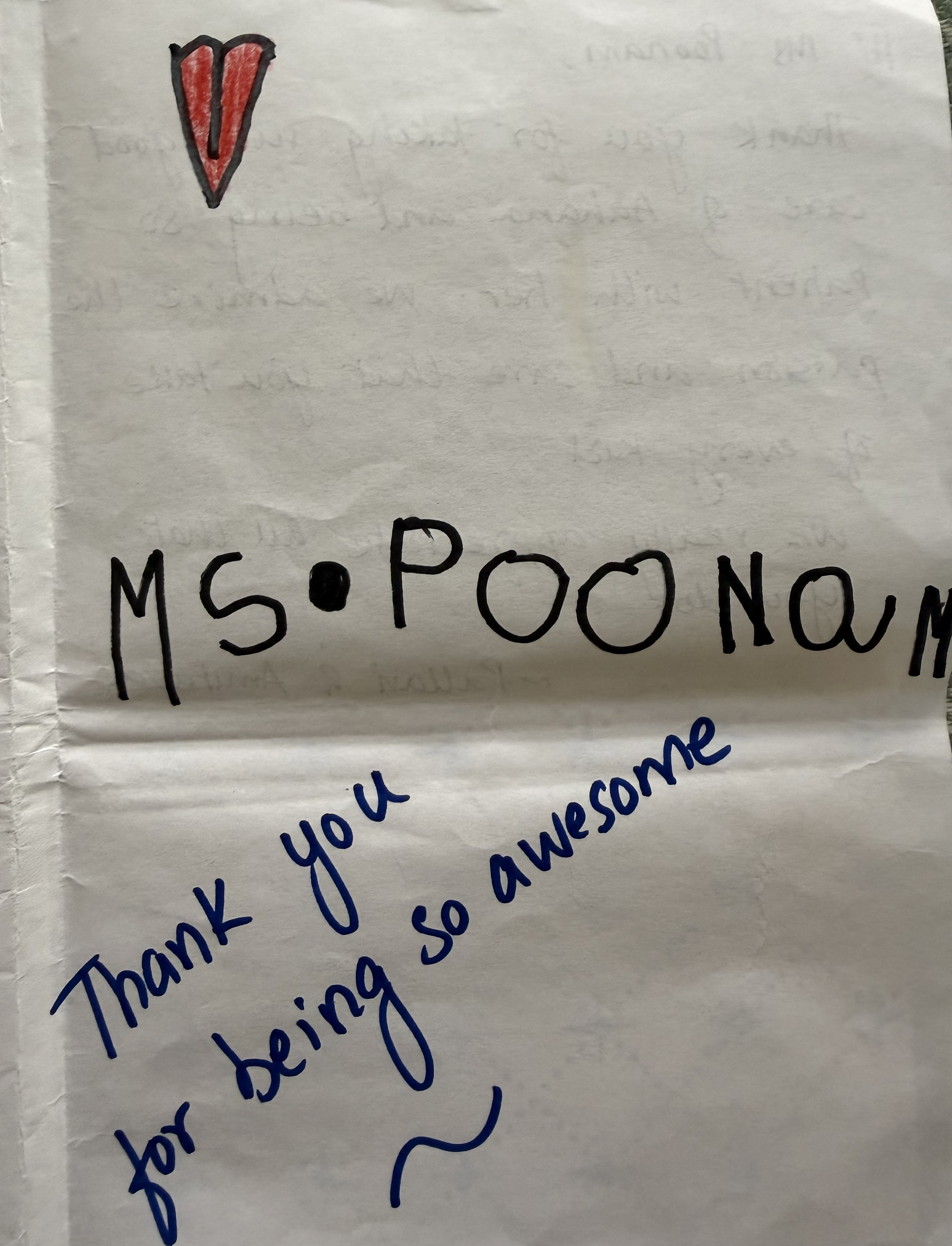 Child drawing and note from a NurtureNest student