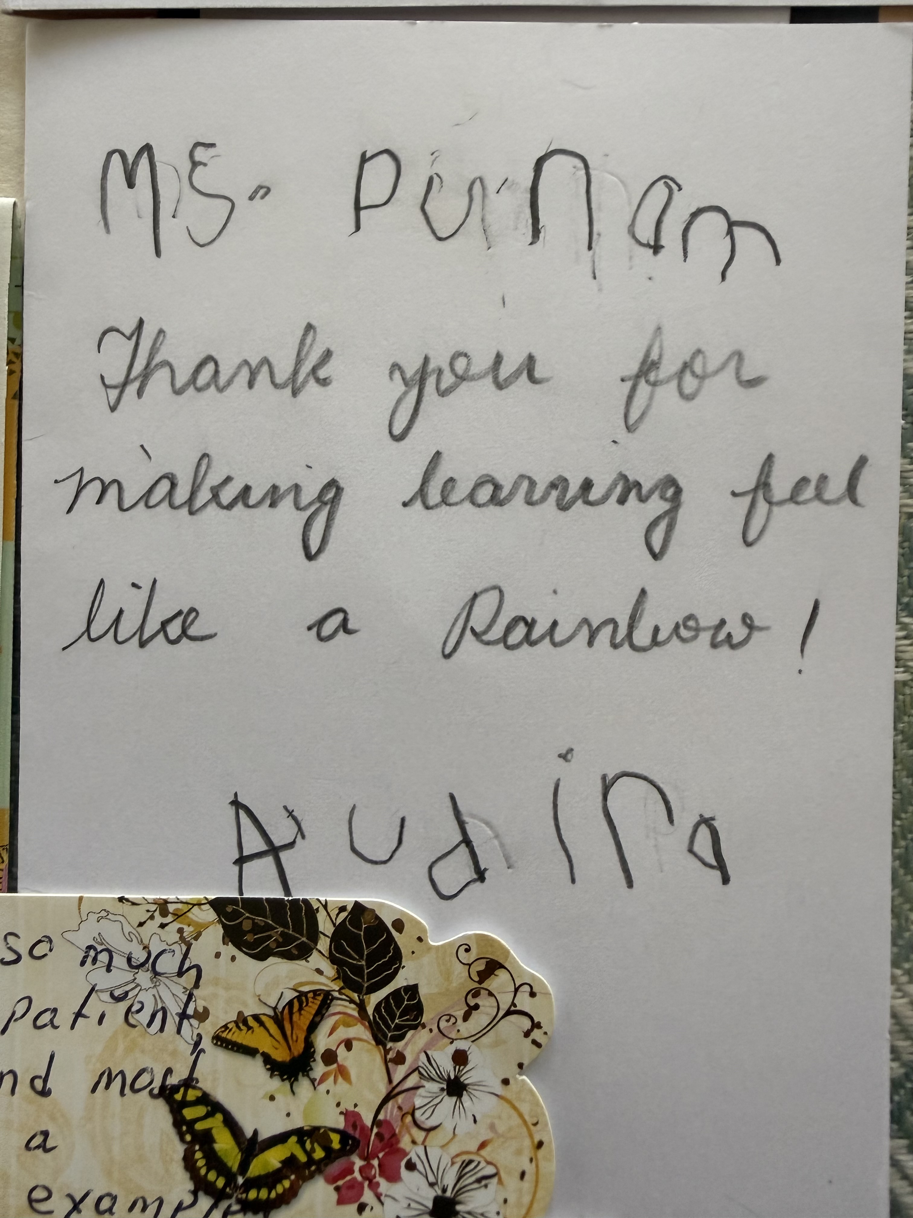 Child drawing and note from a NurtureNest student