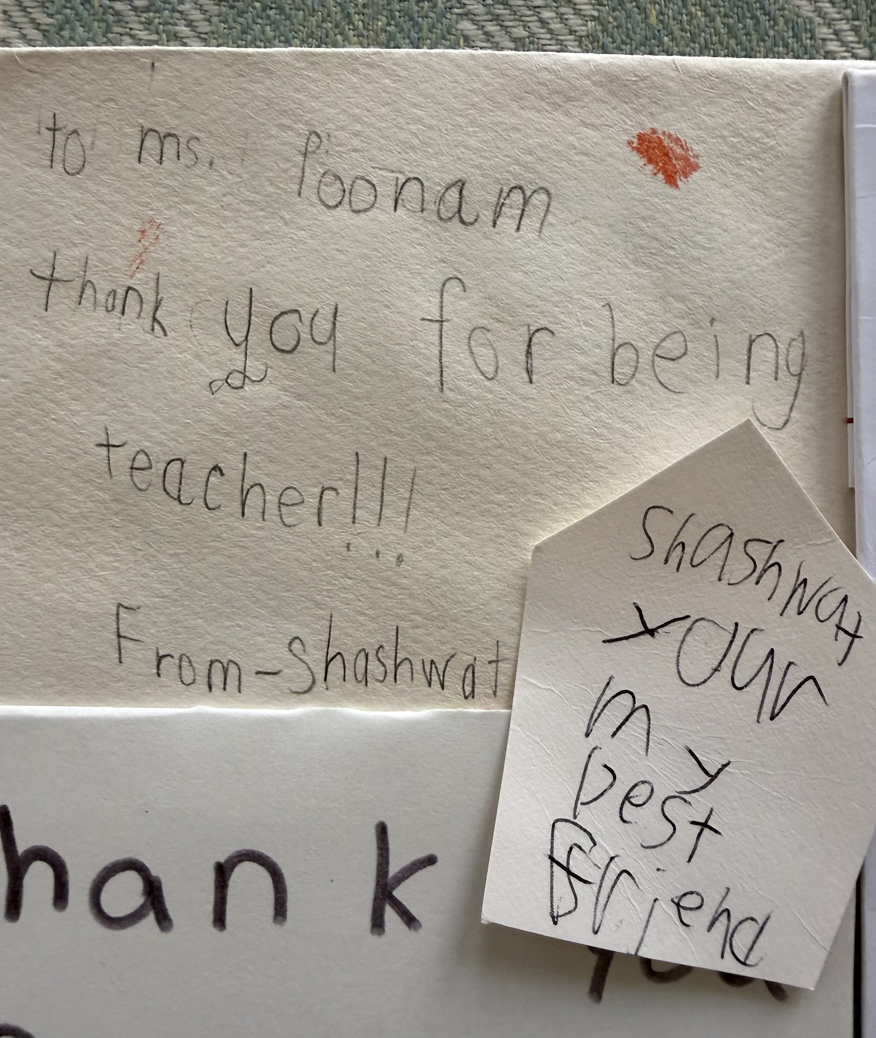Child drawing and note from a NurtureNest student